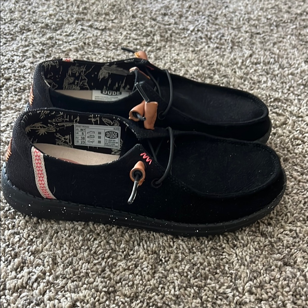 Women’s Hey Dude Black Slip-On Loafers. New without tags. Size 7